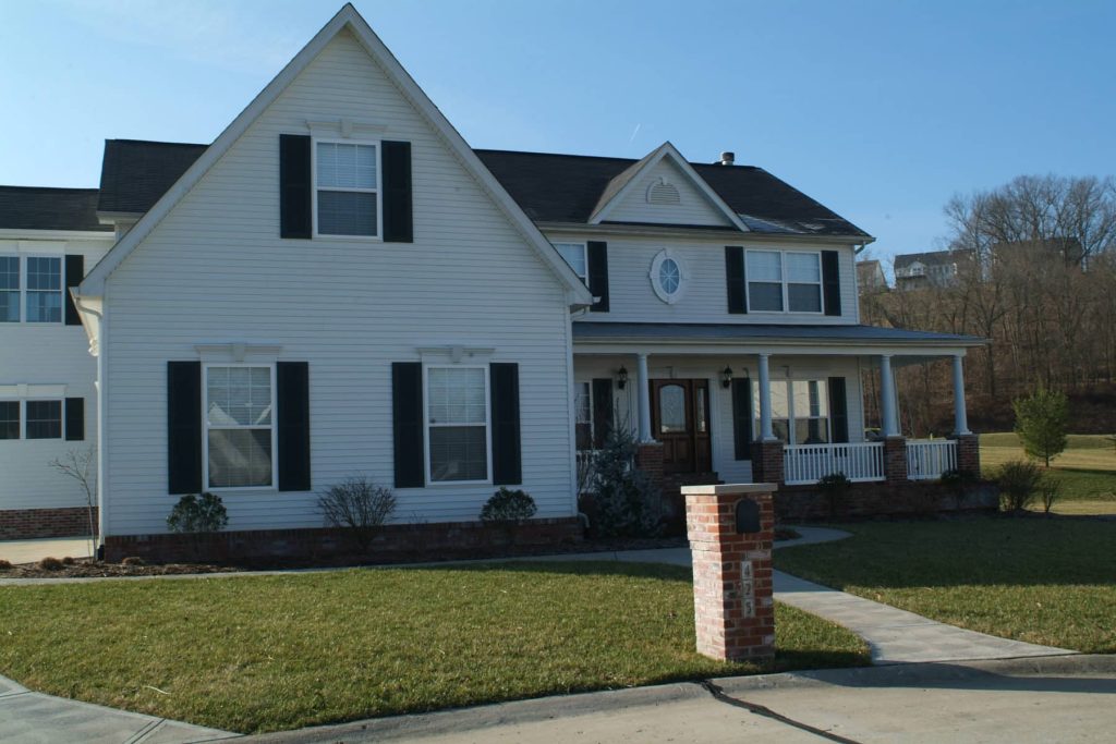 Stockell Custom Homes photo of the front of a whtie house