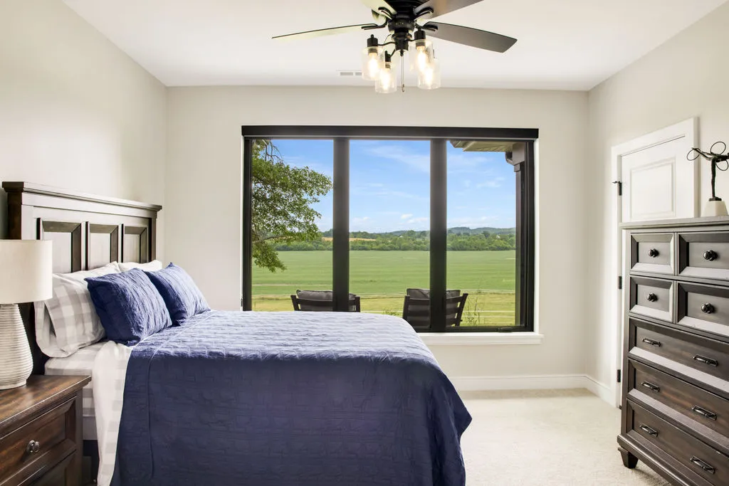 Stockell Custom Homes photo of front of new modern ranch home bedroom
