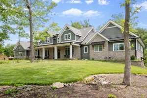 Stockell Custom Homes photo of the front of a green home