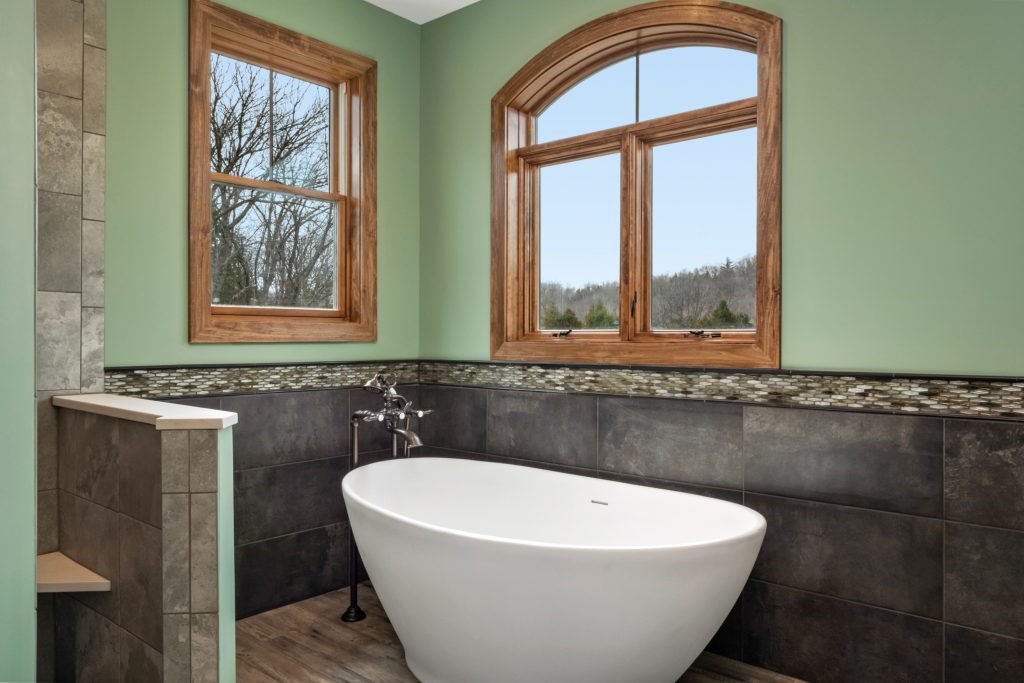 Stockell Custom Homes photo of bathroom corner tub and windows