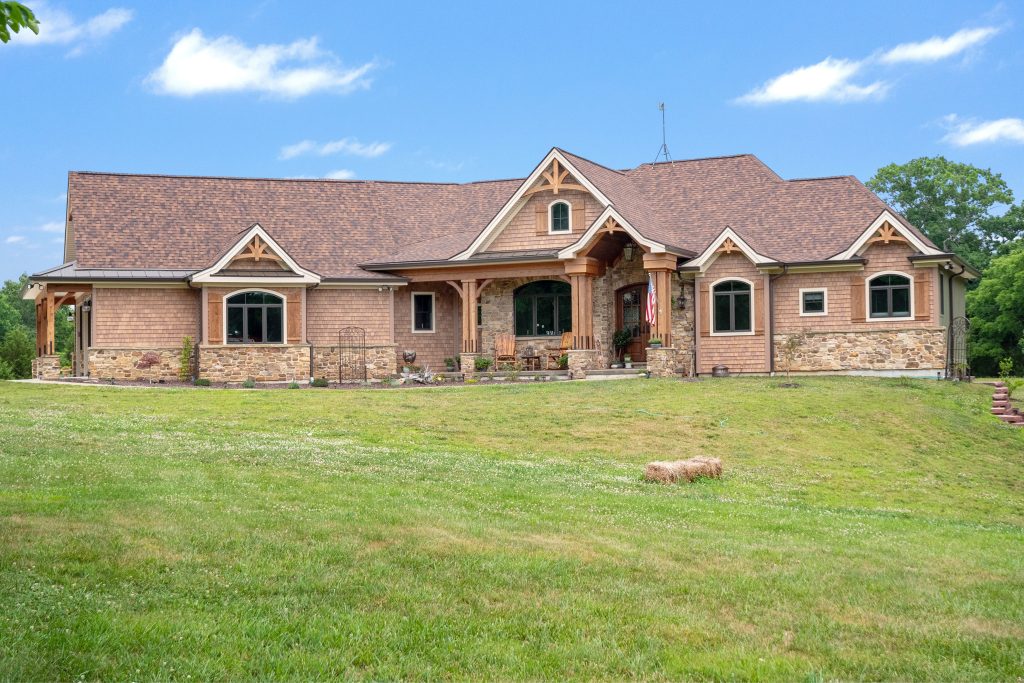Stockell Custom Homes photo of timber frame home front elevation