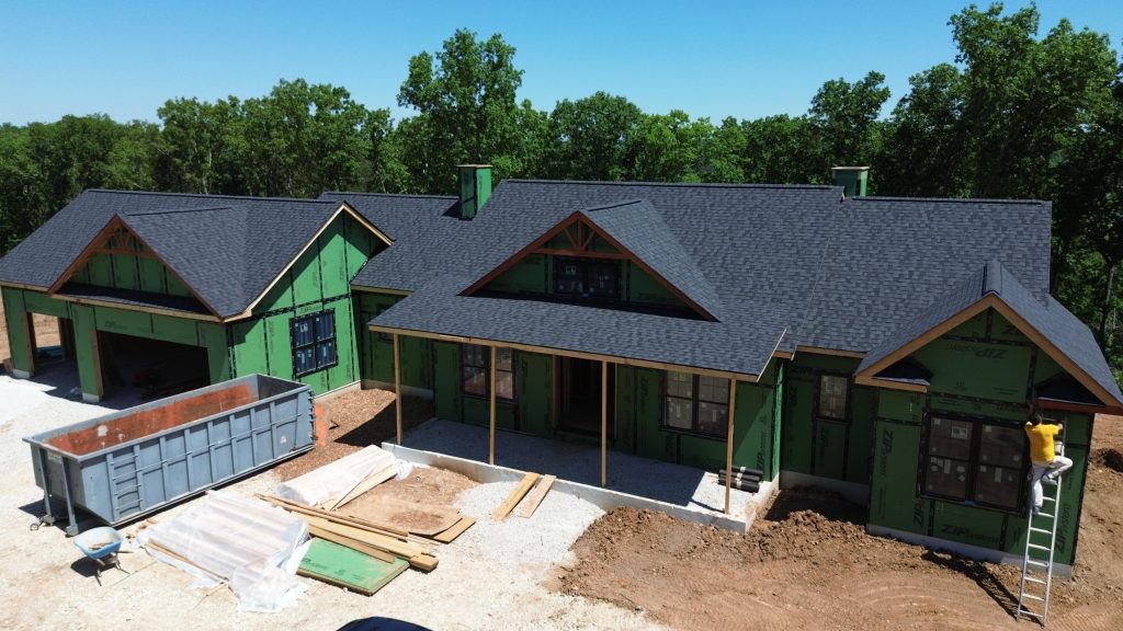 Stockell Custom Homes photo of finished roof on new custom home build